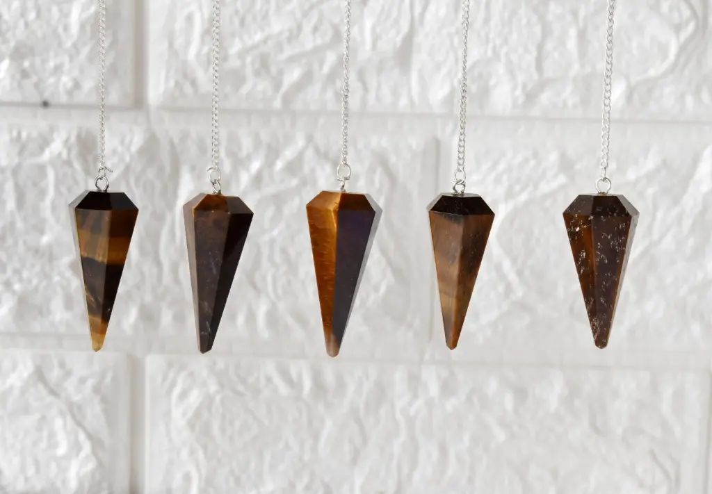 [pend-tig] Tiger Eye Faceted Crystal Pendulum